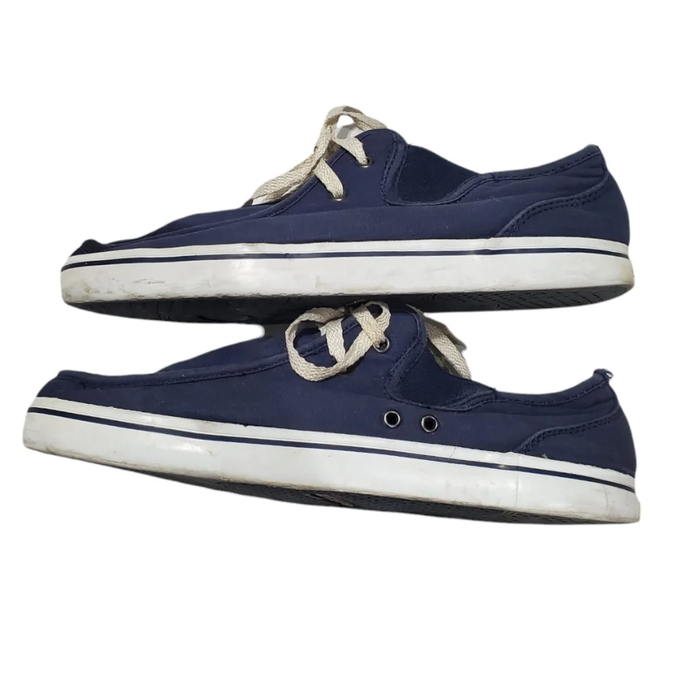 Men's blue and white Lugz sneakers.